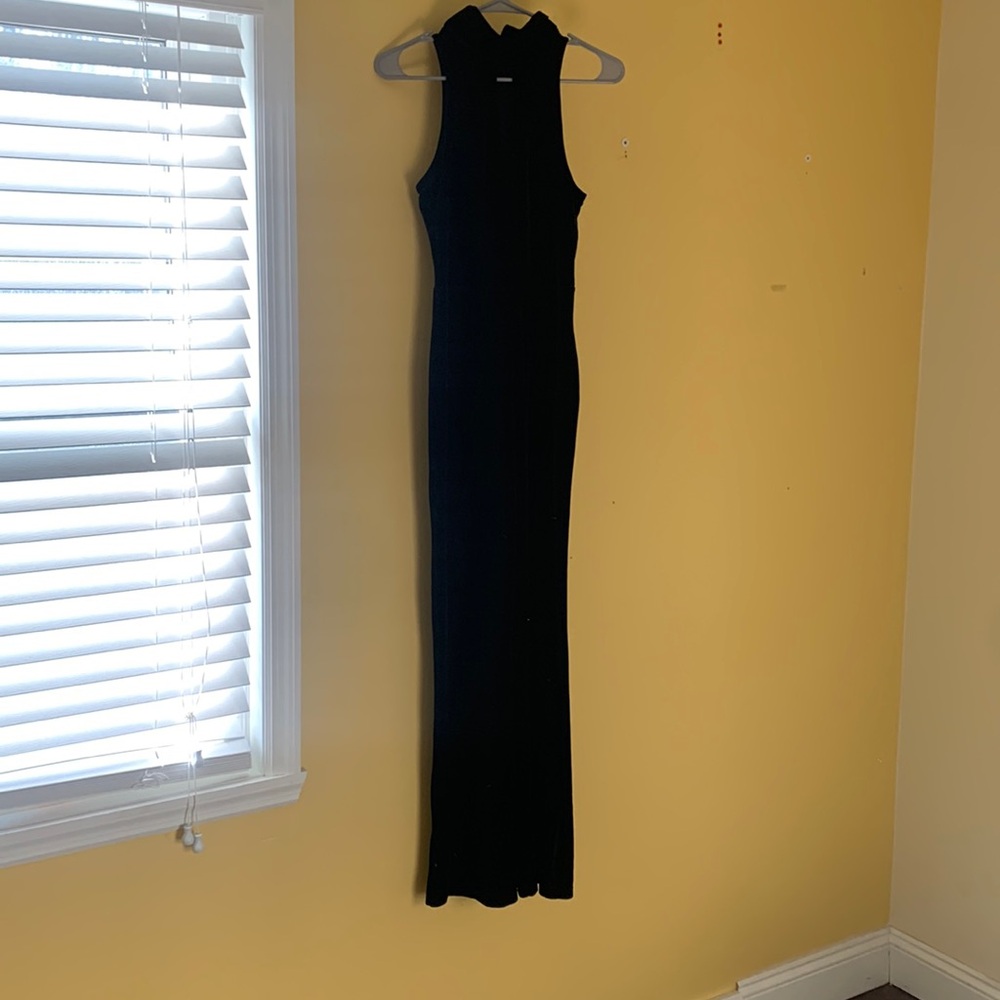 Women’s black velour jumpsuit. High neck, black half zip in the back. Size US 2